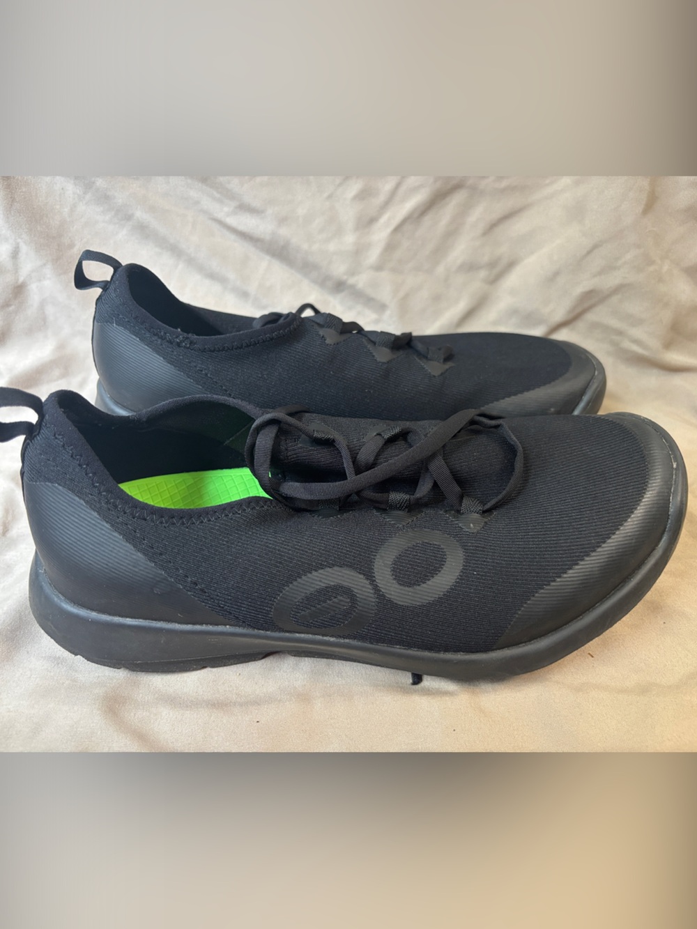OOFOS Black Slip-On Sneakers with Neon Green Insole